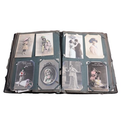 Lot 184A - Two postcard albums, greetings, topographical, comic, filmstars etc.