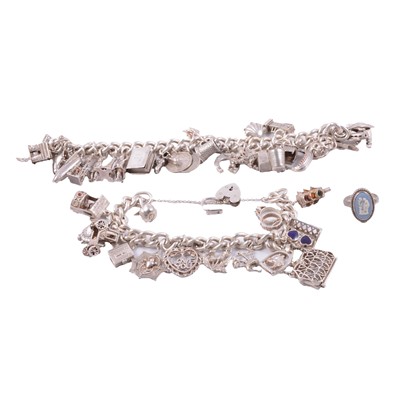 Lot 424 - Two silver charm bracelets and a Wedgwood ring.