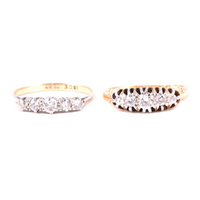 Lot 84 - Two diamond half hoop rings.
