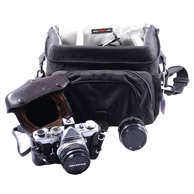 Lot 198 - Olympus OM-1camera, with additional lens, in soft bag.