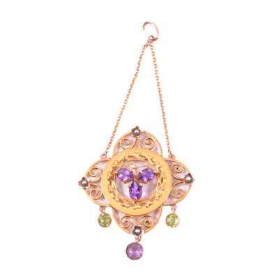 Lot 274 - A yellow metal gemstone set pendant in suffragette colours.