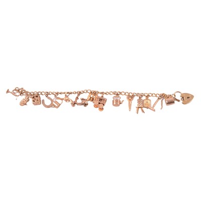 Lot 204 - A 9 carat yellow gold charm bracelet.