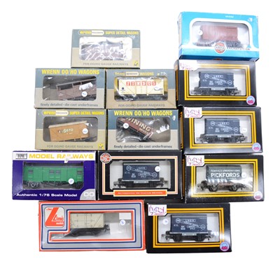 Lot 424 - Thirty-three OO gauge model railway freight wagons and passenger coaches