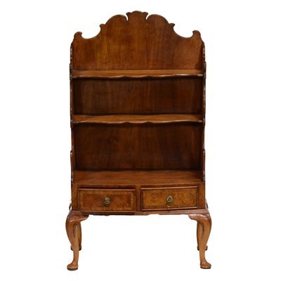 Lot 429 - Small walnut open bookcase, 20th Century, two shelves above two drawers, cabriole legs