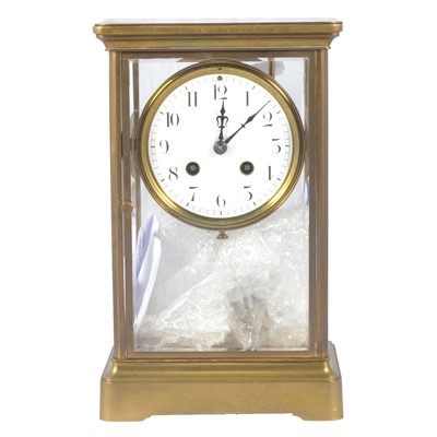 Lot 129 - Four glass mantel clock