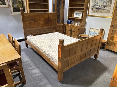 Lot 84 - Robert 'Mouseman' Thompson of Kilburn, an oak panelled double bed, dated 1941