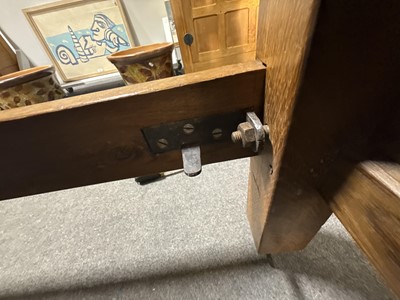 Lot 84 - Robert 'Mouseman' Thompson of Kilburn, an oak panelled double bed, dated 1941