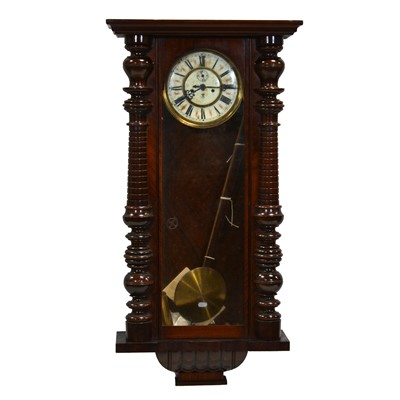 Lot 320 - Walnut Vienna type wall clock