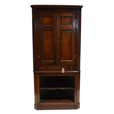 Lot 397 - Georgian oak freestanding corner cupboard