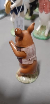 Lot 38 - Thirteen Beswick Pig Promenade figurines.