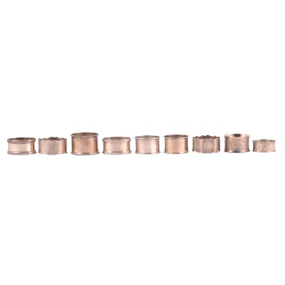 Lot 337 - Eight silver and one plated napkin rings