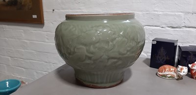 Lot 9 - A large possible Longquan celadon glaze jardiniere