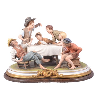 Lot 33 - Large Capodimonte group - The Plate Trick by Bruno Merli