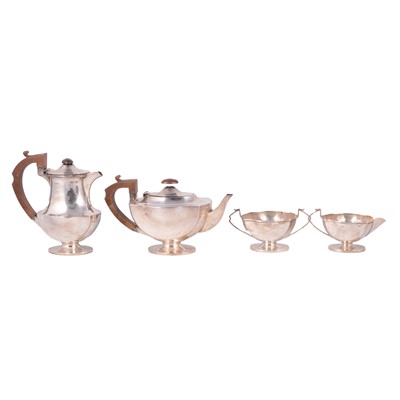 Lot 45 - Silver three piece teaset and a matched silver hot water jug