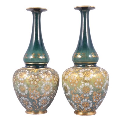Lot 3 - Royal Doulton, a large pair of bottle vases