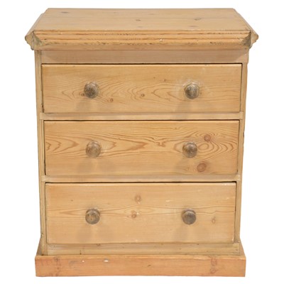 Lot 436 - Pine chest of drawers and a small pine framed wall mirror