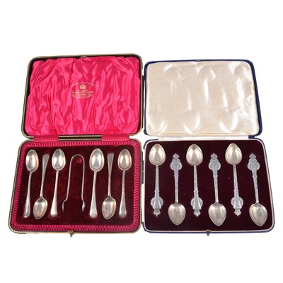 Lot 313 - Set of six commemorative silver teaspoons, George VI 1937; and another set of silver teaspoons and tongs, both cased
