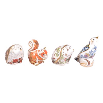 Lot 44 - Four Royal Crown Derby Paperweights
