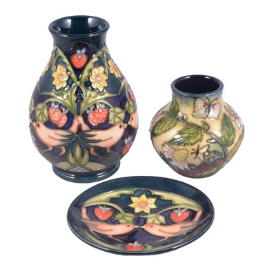 Lot 33 - Moorcroft Pottery, two 'Strawberry Thief' pattern pieces and a 'Fruit Garden' vase