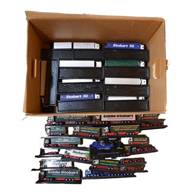 Lot 122 - Atlas Eddie Stobart die-cast model vehicles, thirty-eight, on plastic stands