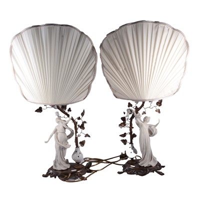Lot 523 - Pair of gilt metal and bisque porcelain figural table lamps