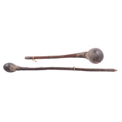 Lot 200 - Two carved African hardwood knobkerries