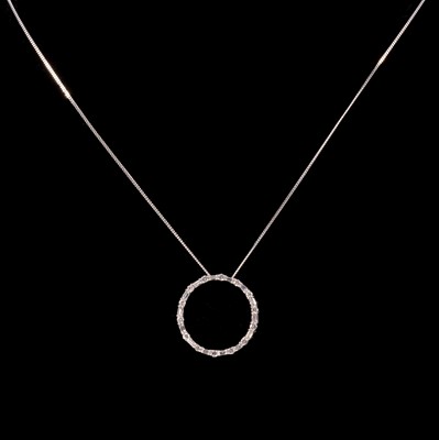 Lot 254 - A modern circular diamond garland pendant on a chain.