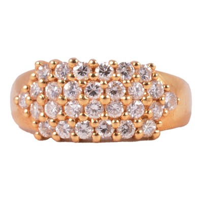 Lot 92 - A diamond four row half hoop ring.