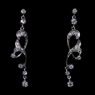 Lot 237 - A pair of diamond drop earrings.