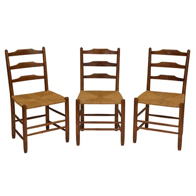 Lot 451 - Three 'Clissett' design Arts and Crafts ladder-back chairs, Neale workshops