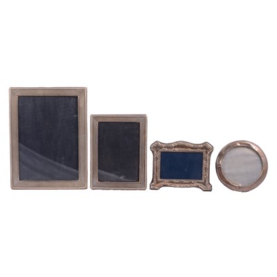 Lot 305 - Silver-mounted photograph frame, import marks for P H Vogel & Co, London 1975, and three others.