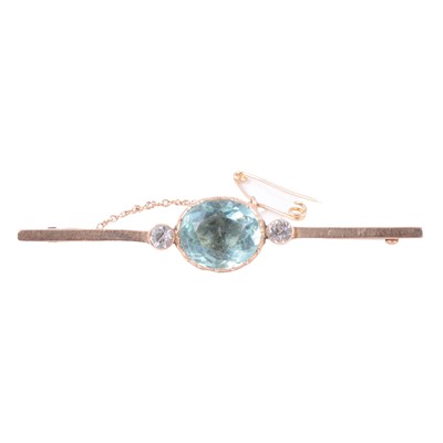 Lot 185 - A pale blue and white stone (not diamond) bar brooch.