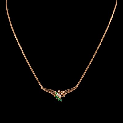 Lot 260 - A modern emerald and diamond necklace.