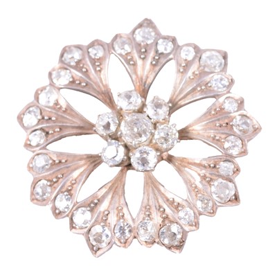 Lot 164 - A diamond floral brooch.