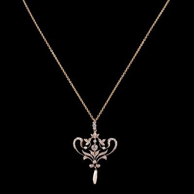 Lot 252 - A diamond and pearl pendant on a chain.