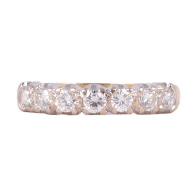 Lot 88 - A diamond half hoop ring.