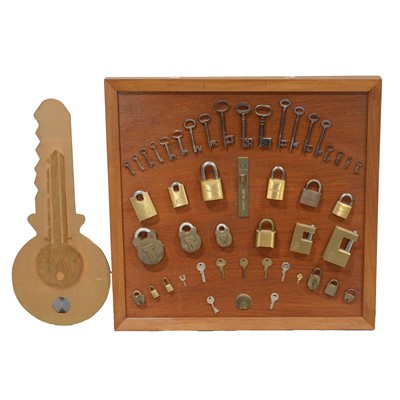 Lot 134 - A Locksmith's display arrangement, and Key-shaped sign