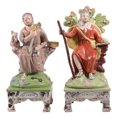 Lot 43 - Two Staffordshire earthenware figures St. Peter and St. Paul