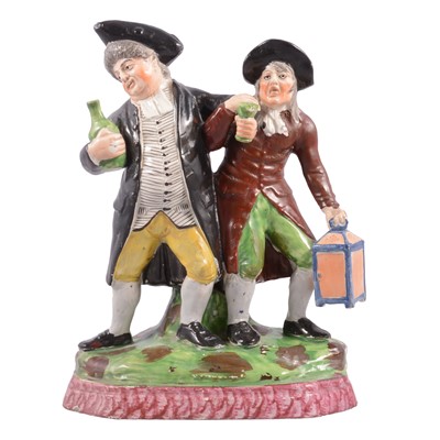 Lot 109 - Staffordshire earthenware group, Drunken Revellers