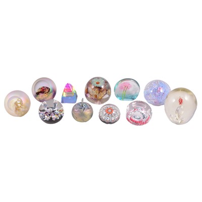 Lot 19 - Millefiori glass paperweight, slice cut; and a collection of paperweights including Mdina.