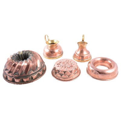 Lot 199 - Copper and brass ware including jelly moulds, jugs, pans