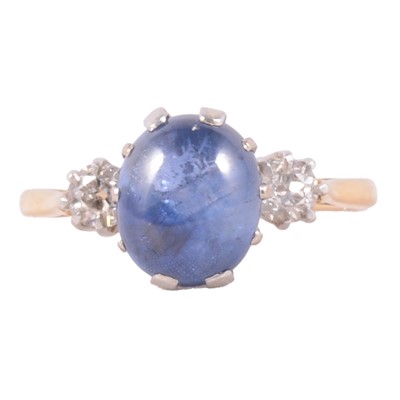 Lot 1 - A sapphire and diamond three stone ring.