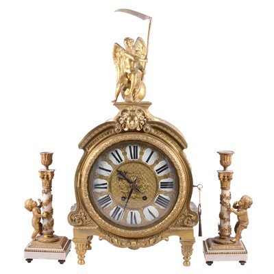 Lot 217 - French gilt metal mantel clock, and a pair of matched garniture candlesticks