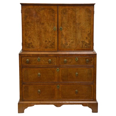 Lot 330 - Walnut cabinet on chest