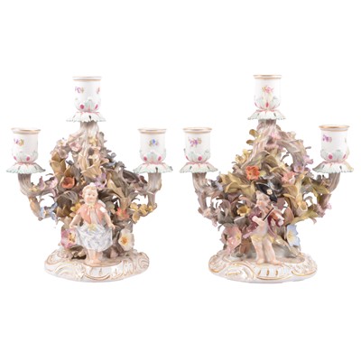 Lot 17 - Pair of Meissen porcelain three-light candelabra
