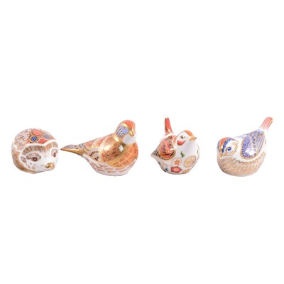 Lot 13 - Four Royal Crown Derby paperweights.