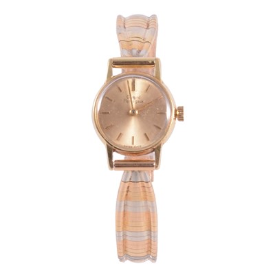 Lot 443 - Girard Perregaux - a lady's yellow metal manual wind bracelet wristwatch.