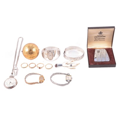 Lot 490 - A Pygmalion globe compact, silver bangle, Ronson lighter, costume jewellery rings, and watches.
