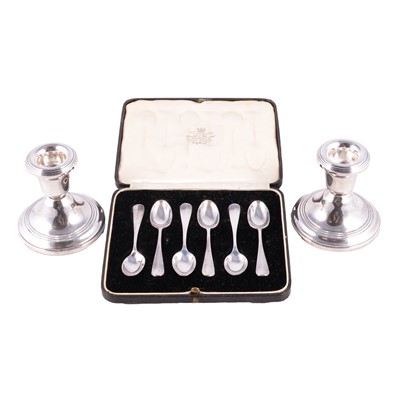 Lot 306 - Set of six silver coffee spoons and a pair of silver dwarf candlesticks