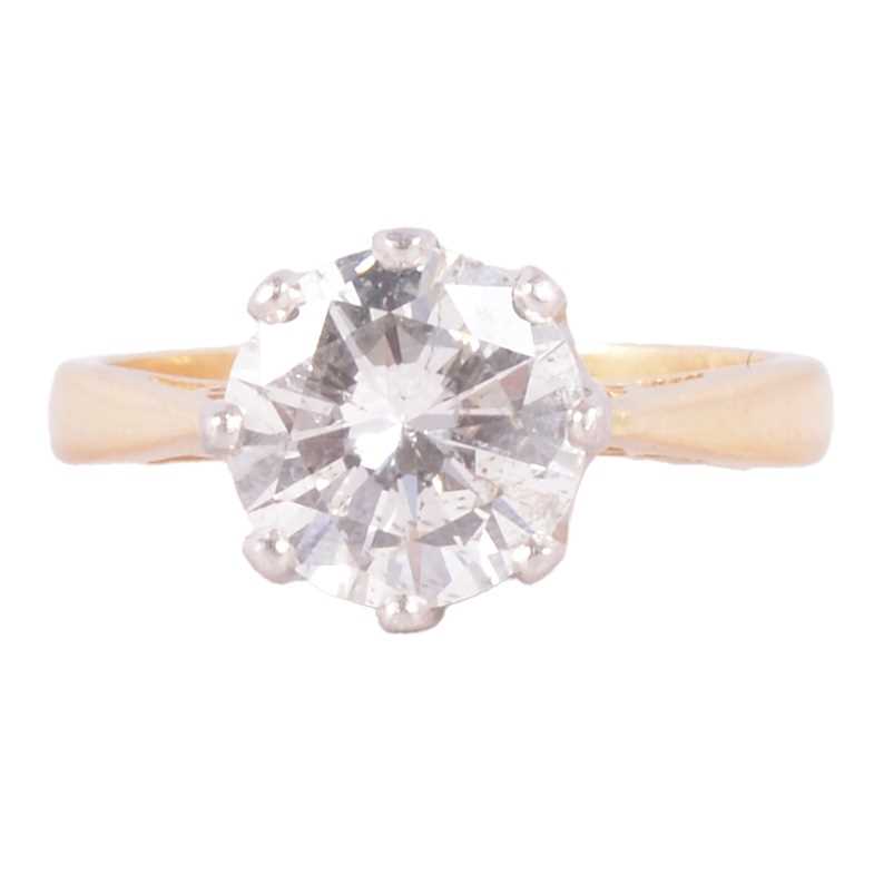 Lot 65 - A diamond solitaire ring.